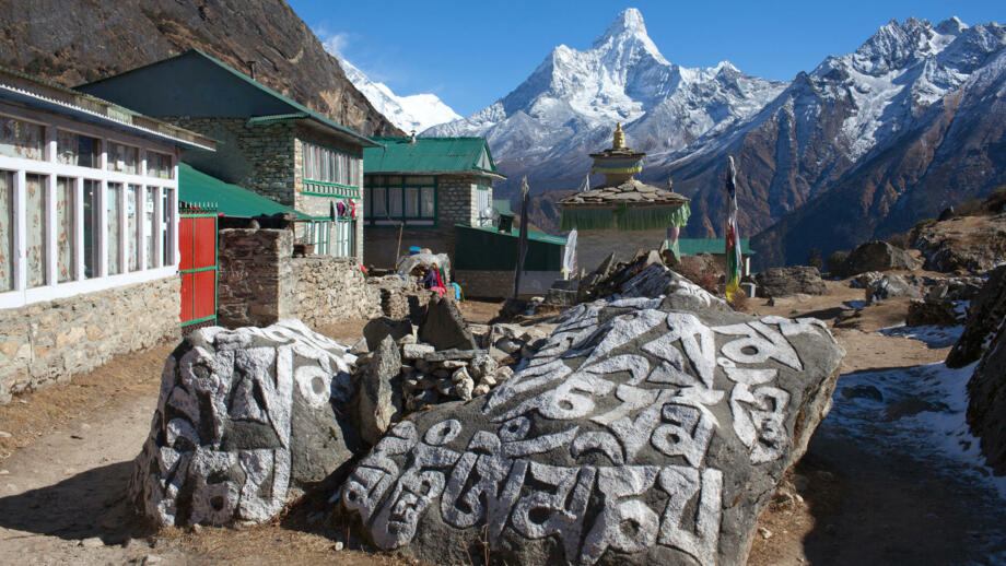nepal-higpeve-ancient-buddhists-chorten-mani-stones-in-khumjung-village-and-ama-dablam-mount-view-shutterstock_1071826601.jpg
