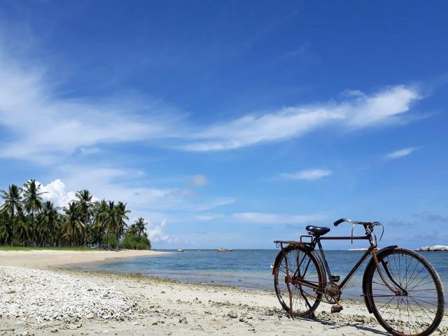 Fahrrad am Strand mit Meer