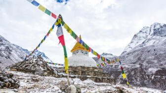 nepal-hiahe-buddhist-stupa-in-pangboche-shutterstock_1620447163.jpg