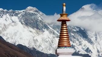 nepal-hiahk-view-of-stupa-at-tengboche-monastery-with-mount-everest-nuptse-to-lhotse-ridge-and-ama-dablam-shutterstock_176994278.jpg