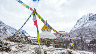 nepal-hiahe-buddhist-stupa-in-pangboche-shutterstock_1620447163.jpg