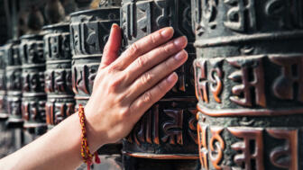 nepal-hiahe-prayer-wheels-at-swayambhunath-monkey-temple-in-kathmandu-shutterstock_1109929307.jpg