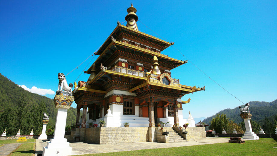 bhutan-bhkom-the-khamsum-yulley-namgyal-chorten-stupa-in-the-punakha-valley-shutterstock_1558953113.jpg