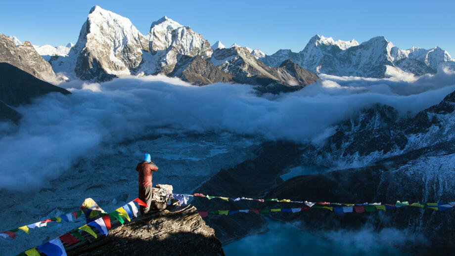 nepal-hihhe-view-from-gokyo-ri-peak-to-ngozumba-glacier-mounts-arakam-tse-and-chola-tse-khumbu-valley-shutterstock_1958536891.jpg